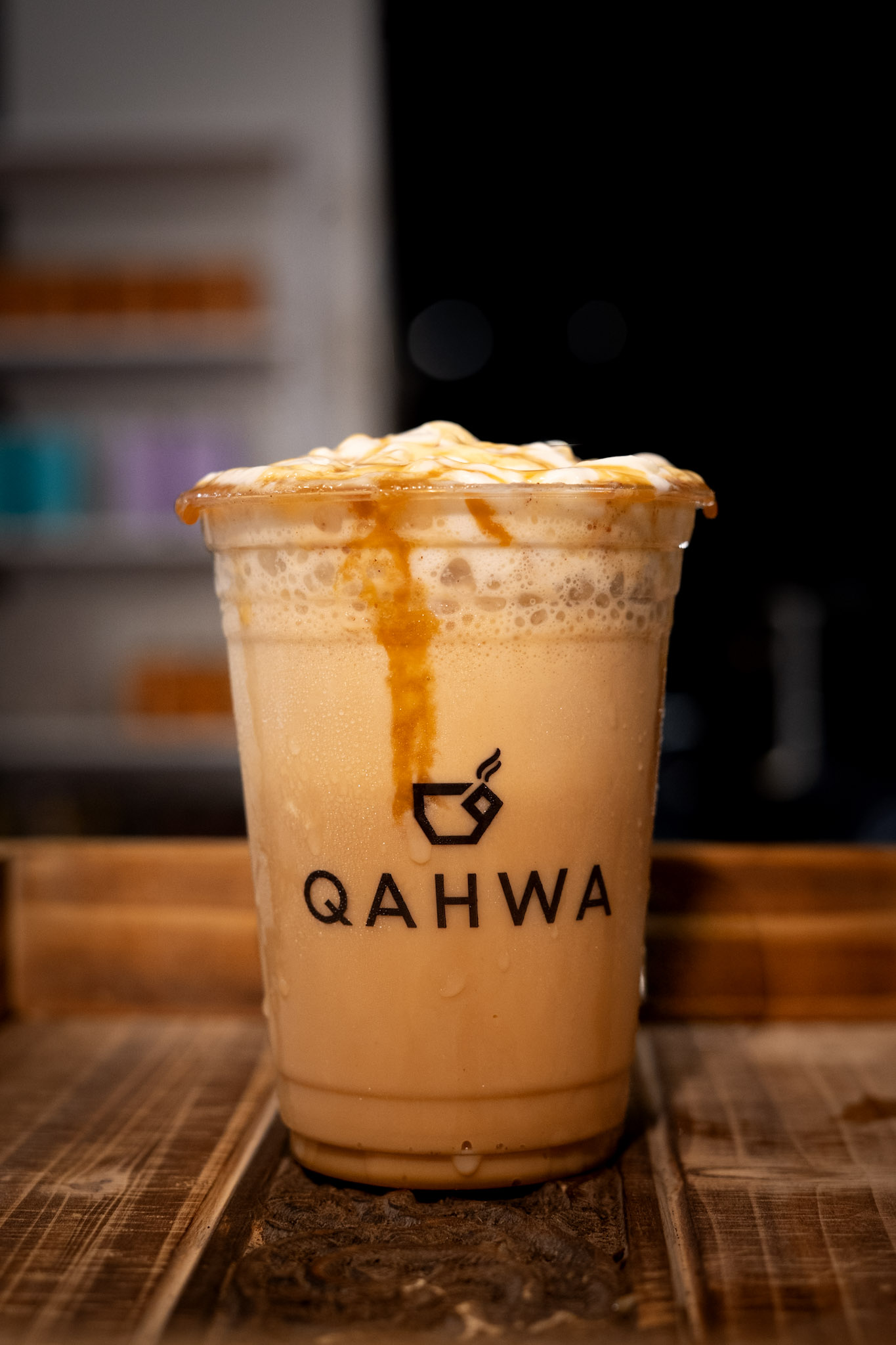 Moody product shot from the Qahwa Cafe fall menu shoot with a caramel drip